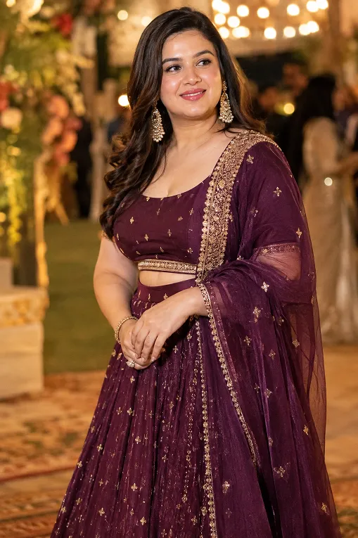 plum coloured lehenga as a safe wedding guest colour choice