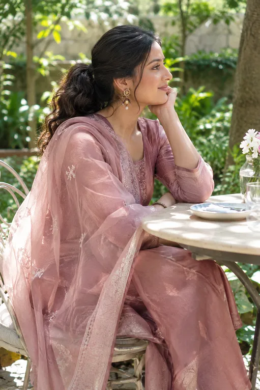 Woman in a soft cotton silk kurta set and net dupatta at a farewell lunch