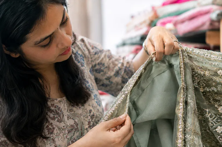 Checking seam allowance on a lehenga for future alterations