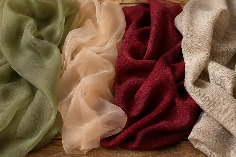 comparison of georgette, chiffon, crepe and linen saree fabric swatches for monsoon
