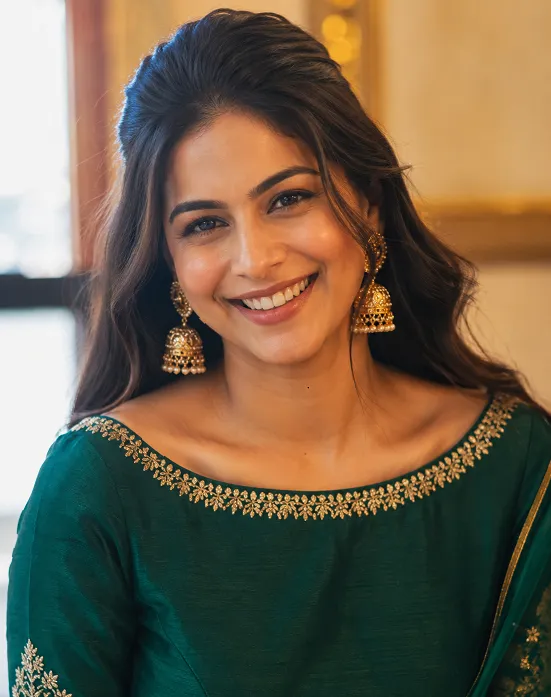 boat neck lehenga blouse with statement earrings for a pear body shape