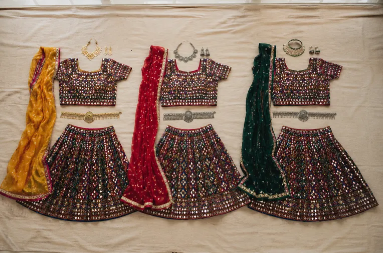 Same chaniya choli styled with different dupatta and jewellery colours for garba nights
