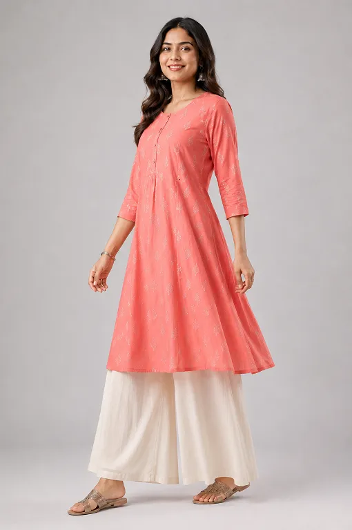 Same flared kurti styled with a wide leg palazzo adding extra volume at the hip