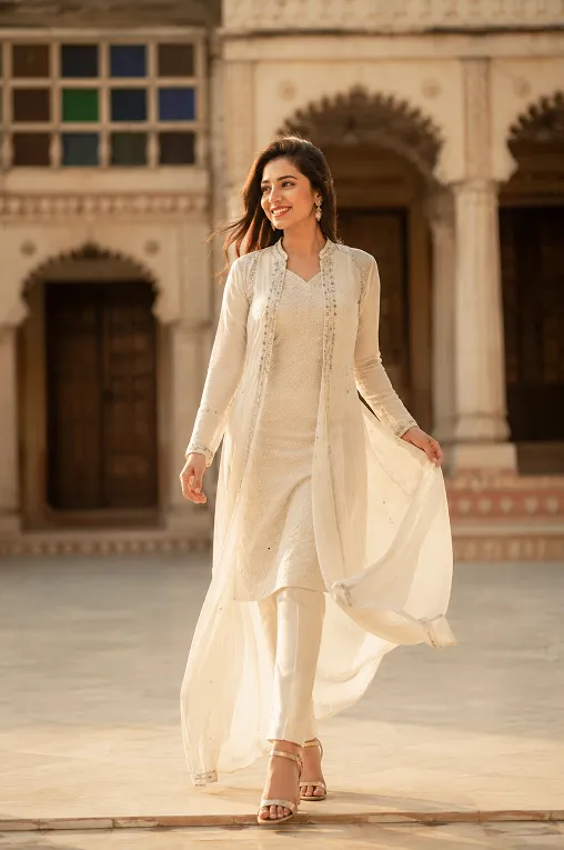 Floor length ethnic jacket layered over a kurta for petite styling