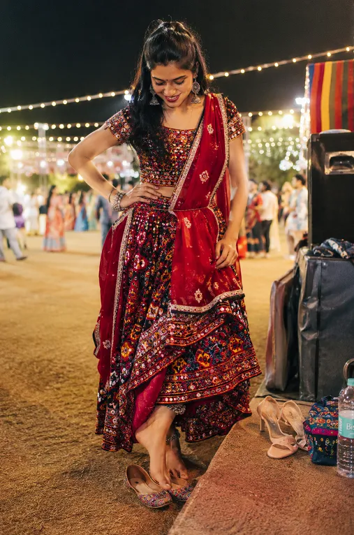 Choosing comfortable flats over heels for a full night of garba dancing