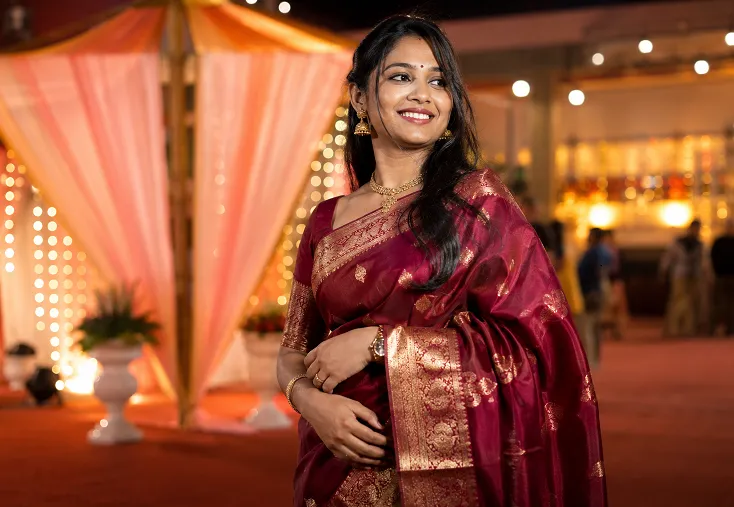 Banarasi silk saree natural dye drape at wedding function