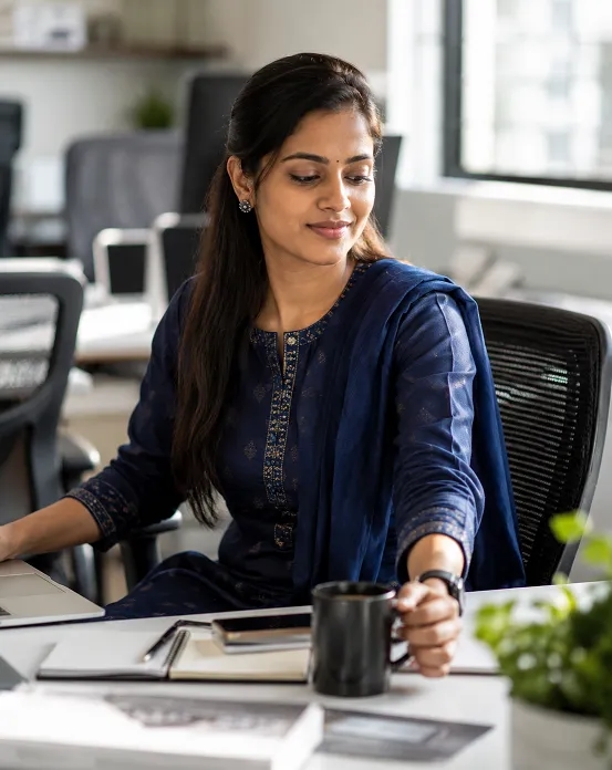 working woman wearing durable salwar kameez fabric suited for a full office day