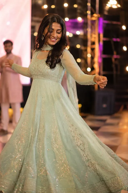 floor length georgette Anarkali styled for dancing at a sangeet function