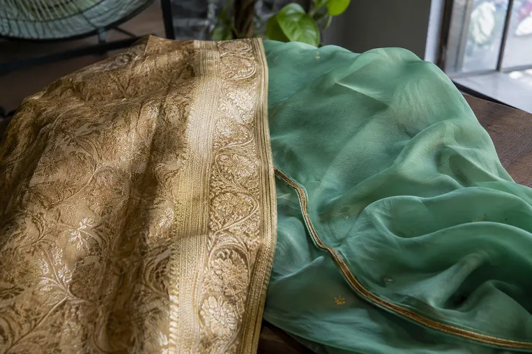 heavy border silk saree versus lightweight georgette saree fabric comparison