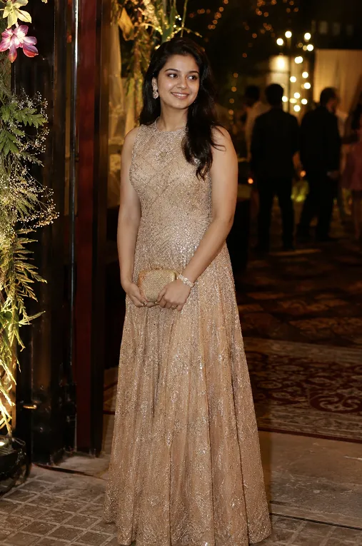 Floor length Indo-western gown styled as a wedding reception guest outfit