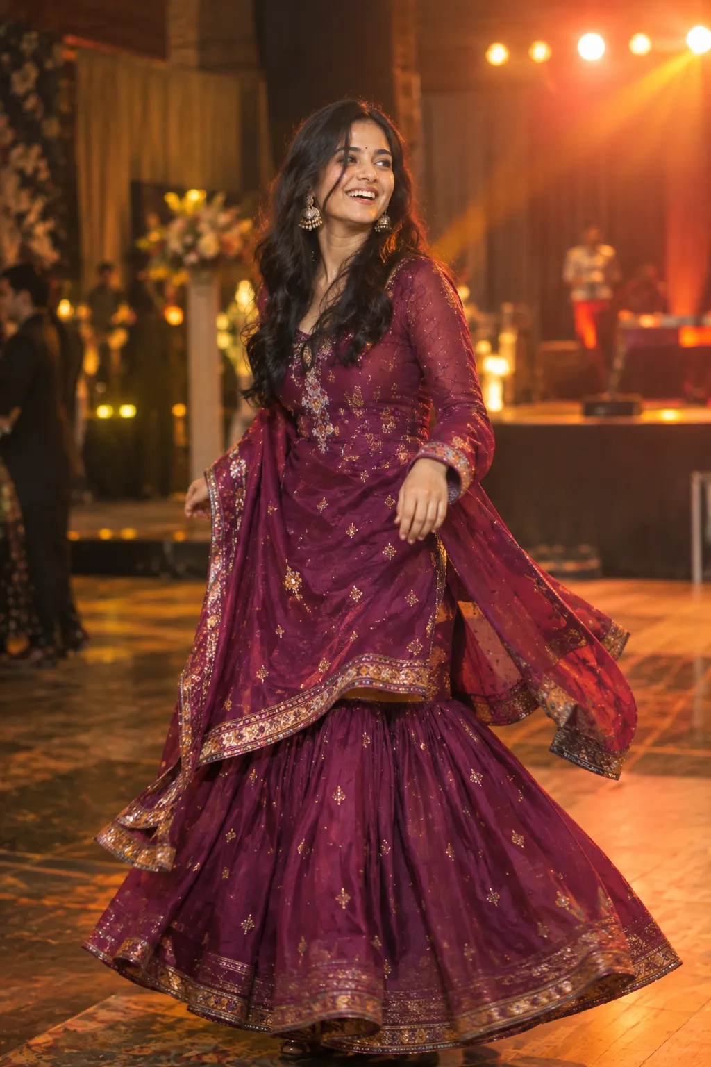 Woman wearing a structured gharara outfit at a sangeet function