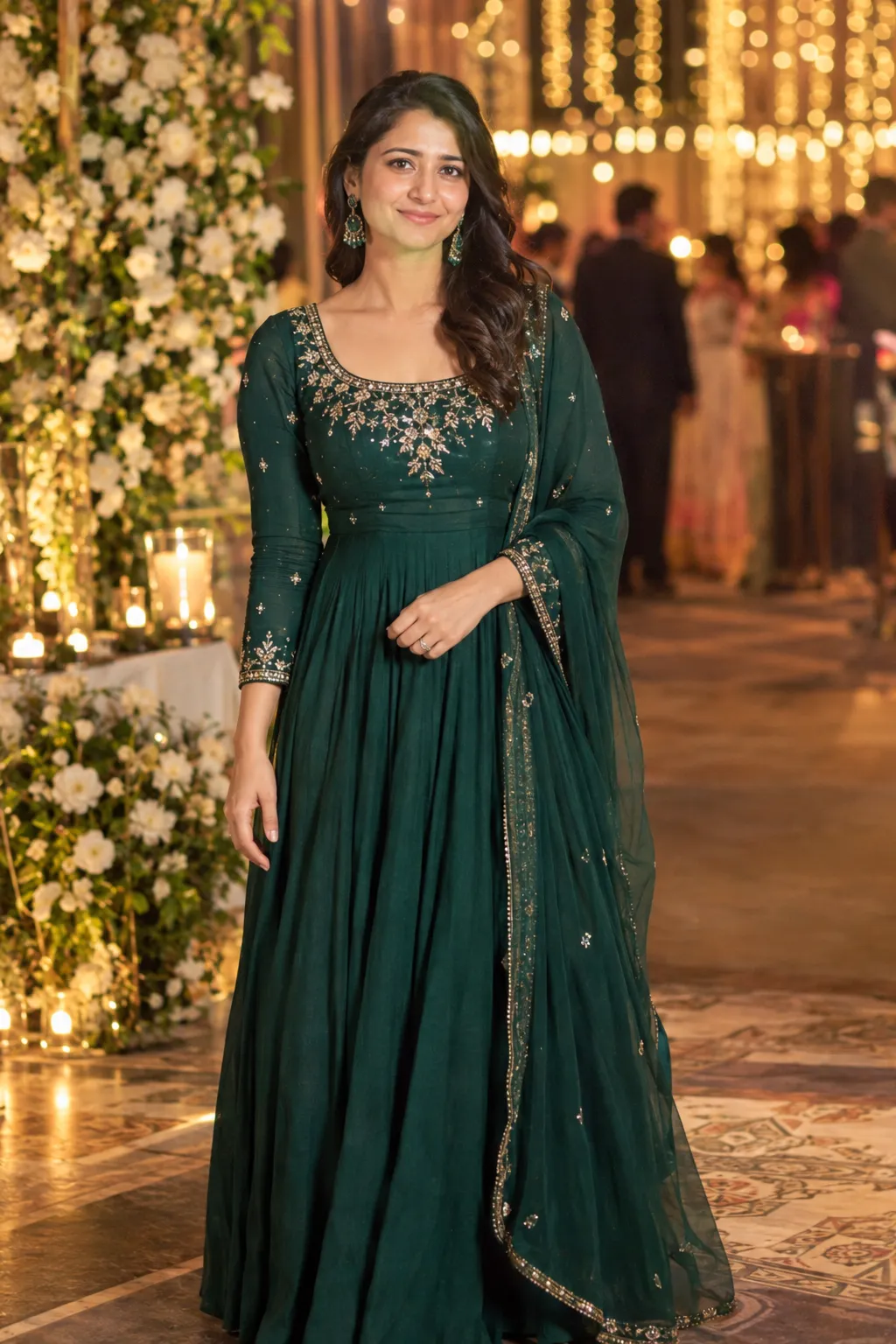Woman wearing an Indian gown styled for a wedding reception